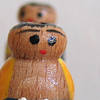 puce en bois verni